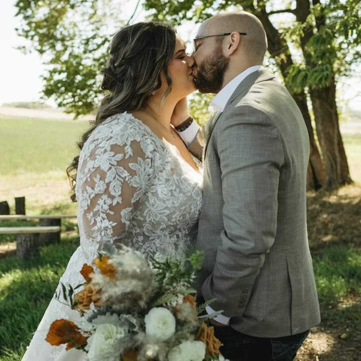 Bride and groom kissing