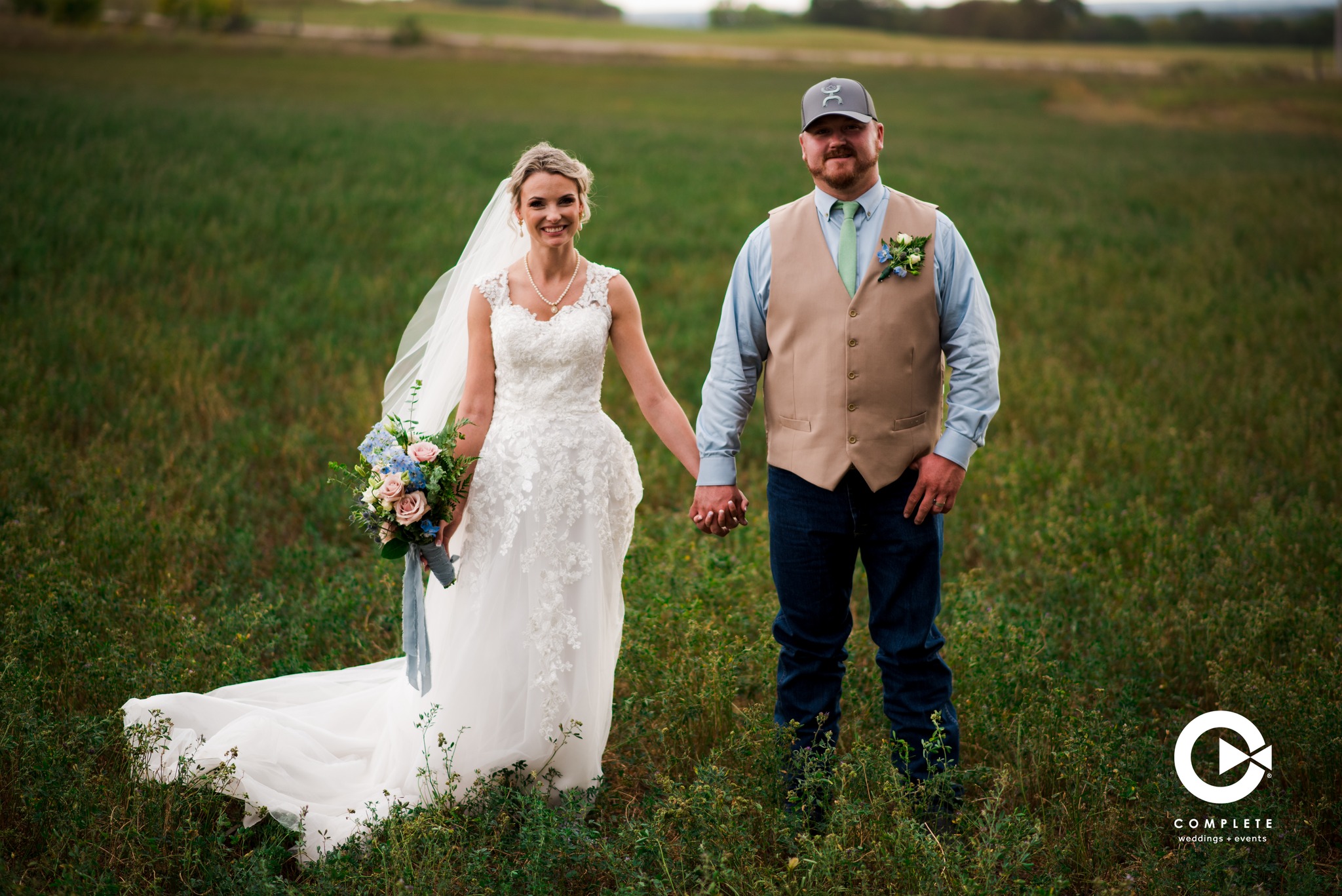 Bride and groom holding hands